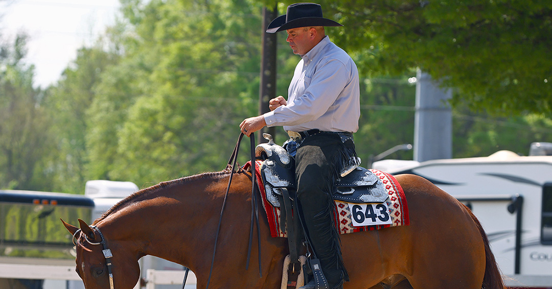 Nick Mayabb riding a sorrel horse